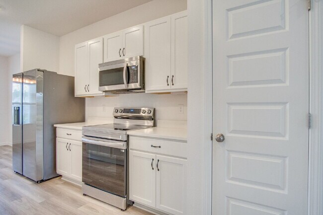 Building Photo - 3BR/2BA Home Near Navy Federal Featuring Quartz Counters, 2-Car Garage & Internet Included