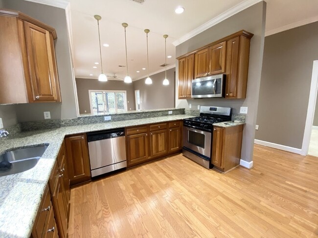 Building Photo - Four Bedroom Townhouse w/ Garage in Seagrass Station!
