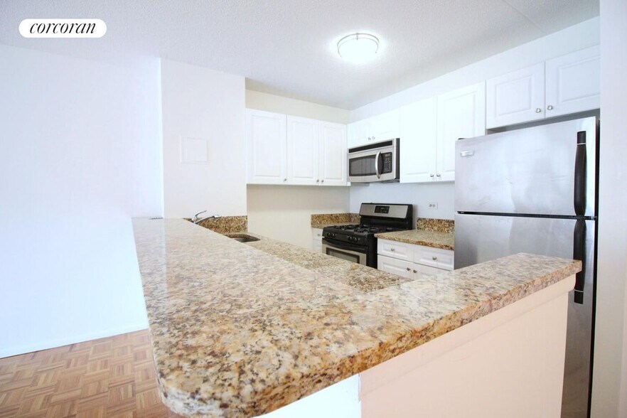 Building Photo - 225 8th Ave