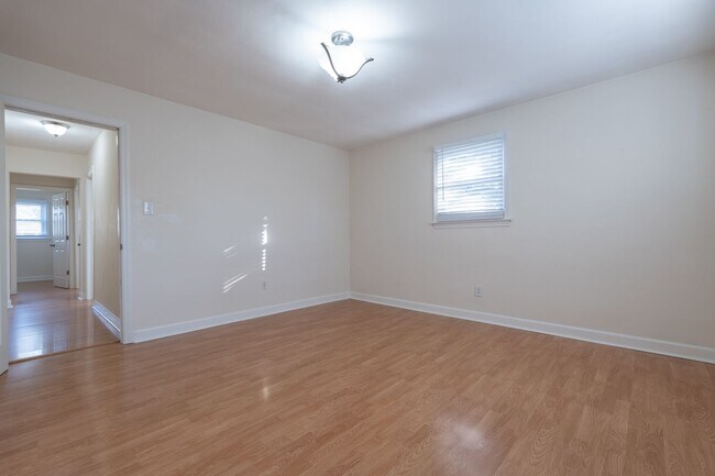 Building Photo - MOVE IN READY 4-bedroom Ranch home nestled in the Heart of Norfolk!