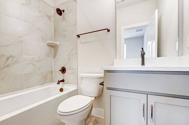 Building Photo - NEW TOWNHOME W/ ROOFTOP TERRACE @ 5West Te...