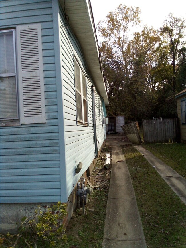 Right side and long driveway - 1600 South Street