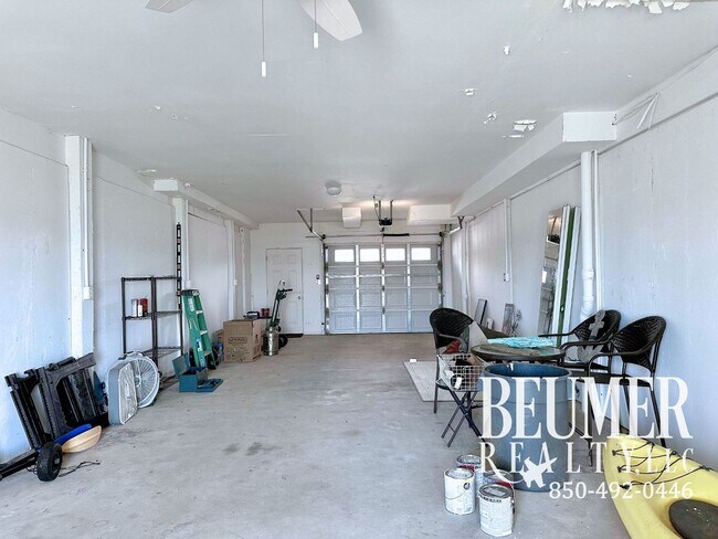 Building Photo - Move-In Ready Intercoastal Waterfront Townhome Steps to the water