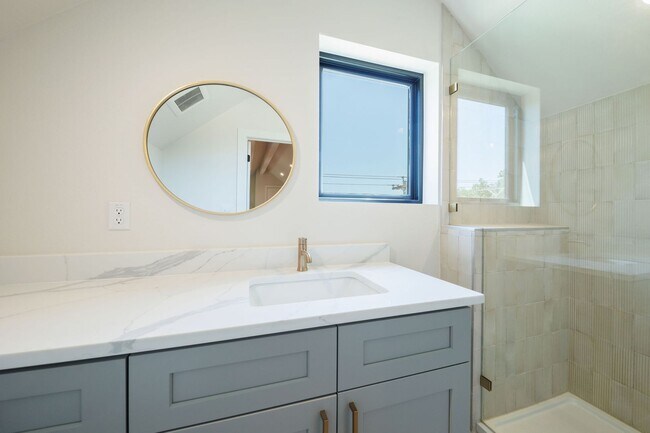 Building Photo - Luxury Redefined: Experience Vibrant Living in this 3-Bedroom Haven in East Austin