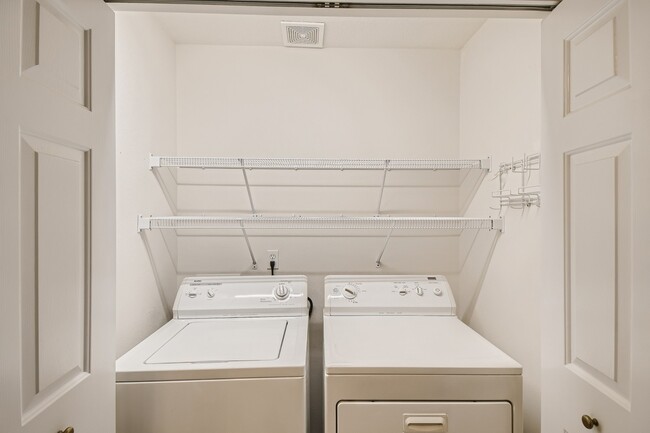 Full sized washer and dryer (in kitchen) - 1437 NE Birkshire Ct