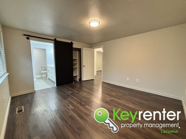 Building Photo - Shared Split level 3 Bed 2 Bath Upstairs Unit with Modern Upgrades Close to JBLM!