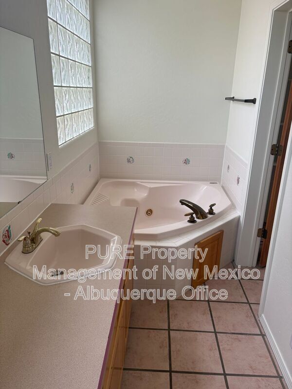 Building Photo - 8220 W Raintree Dr NE
