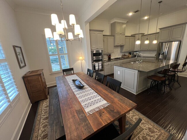 Building Photo - Luxury 4BR Home in Americana | 11 Ft Ceilings, Courtyard Living & Furnished Option