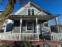 Building Photo - This 3-bed, 1-bath home features original woodwork, a covered front porch, a fenced yard, and an ...