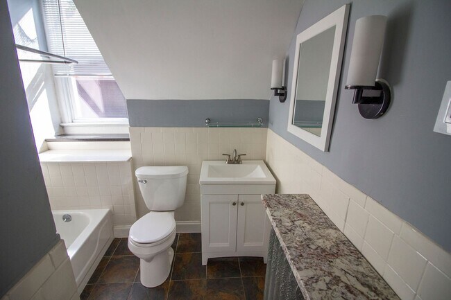 Building Photo - 2 bed/1 bath, Single-family Home! Modern and spacious with off-street parking and a relaxing back...