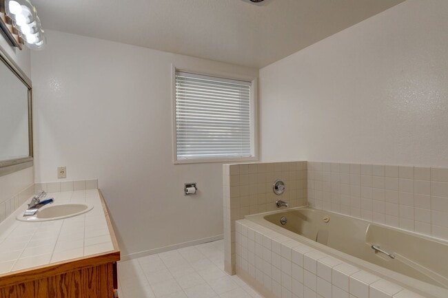 Building Photo - Waterfront Condo with 2 car garage