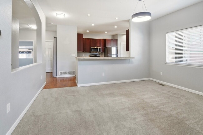 Building Photo - $2,940.45 - 4 Bed, 3 Bath Townhome In Commerce City with Central AC and In Unit Laundry!