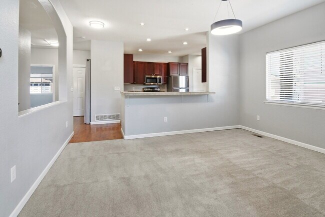 Building Photo - $3,090.95 - 4 Bed, 3 Bath Townhome In Commerce City with Central AC and In Unit Laundry!