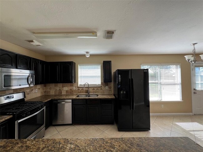 Building Photo - 8411 Tamayo Dr