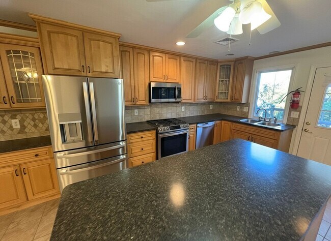 Building Photo - Lakefront 3-Bedroom Home with Dock & Stunning Views