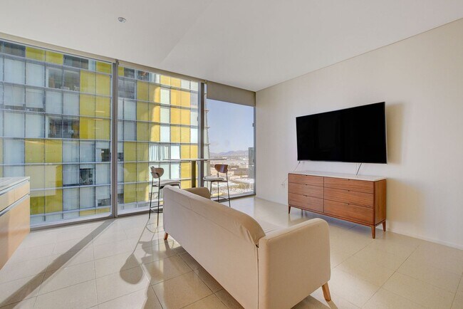 Building Photo - Stunning Strip Views from this Fully Furnished Studio Residence.