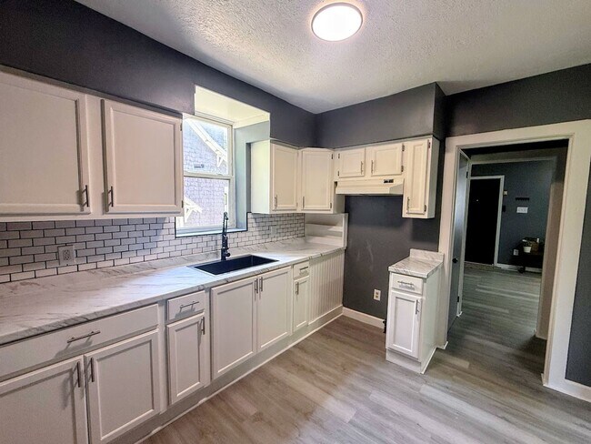 Building Photo - Three bedroom one bathroom single-family home for rent
