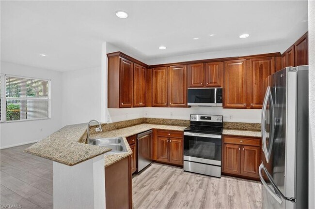 Building Photo - 7054 Ambrosia Ln