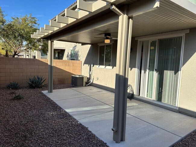 Building Photo - Modern North Las Vegas Townhome with Granite Countertops, Covered Patio & Open-Concept Living