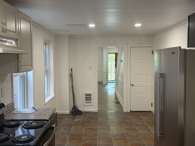 Building Photo - Charming 3 Story Brick Townhome Now Available