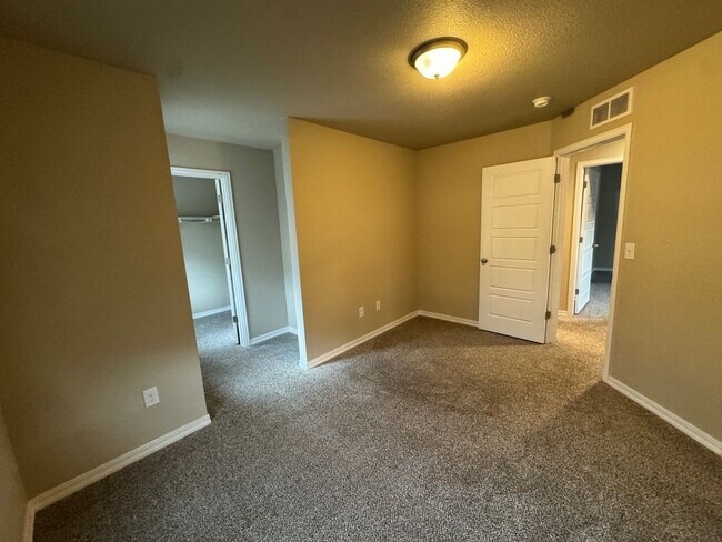 Building Photo - Modern 3-Story Corner Lot Home with Hot Tu...