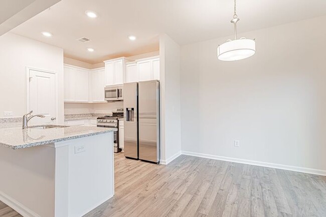 Building Photo - Brand New Townhome in Peachtree Park in Du...