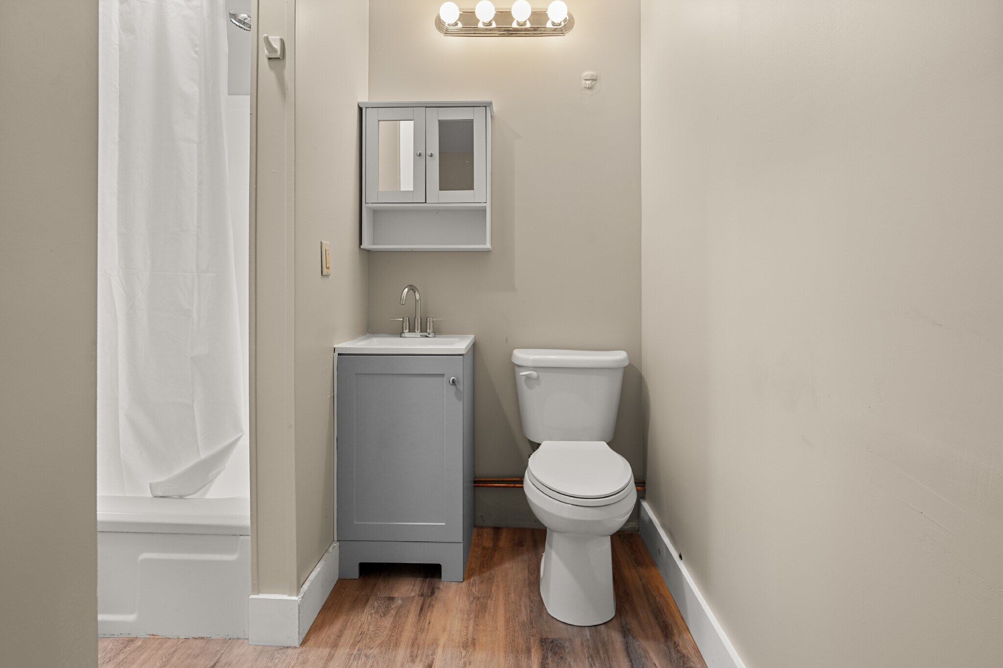 Bathroom, vanity, toilet, medicine cabinet - 334 1st St