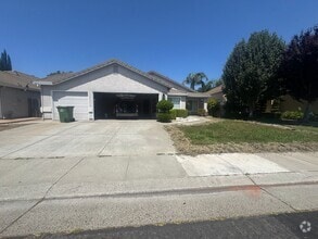 Building Photo - Beautiful 4-Bedroom Home with Solar, High ...