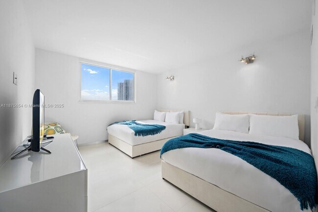 Building Photo - 19370 Collins Ave