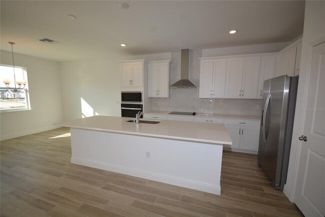 Building Photo - 5144 Firebush Dr