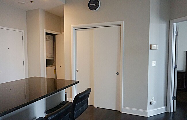 Building Photo - A Modern Living of Top-Level Unit in the C...
