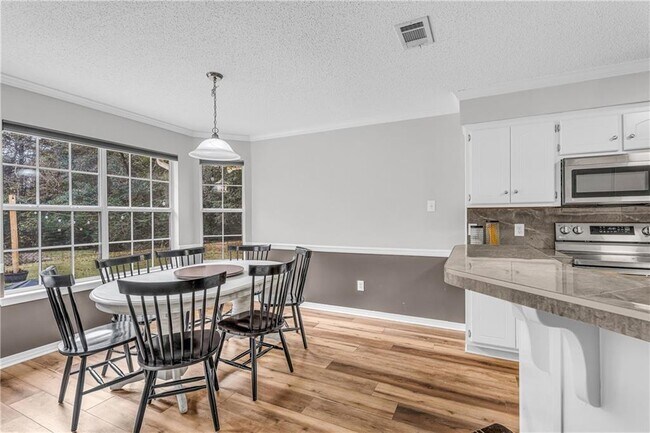 Building Photo - 8171 Woodland Hills Dr