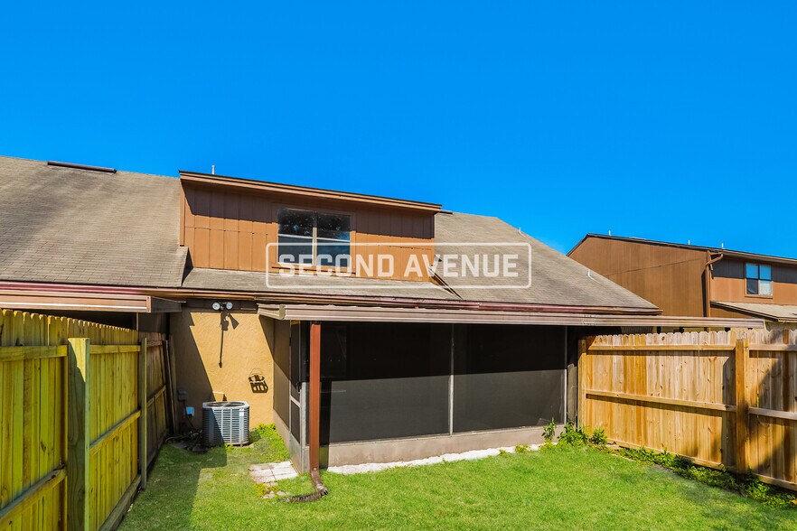 Building Photo - 8781 Whispering Pines Dr