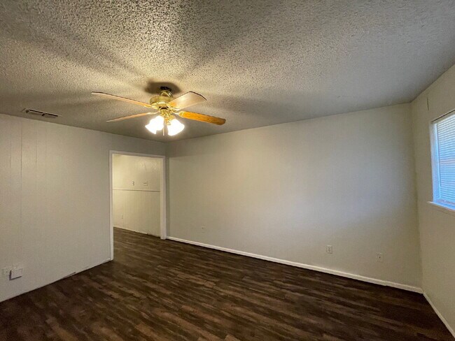 Building Photo - Updated South Lubbock Duplex — Spacious 2BD/1.5BA with Private Yard & Modern Finishes