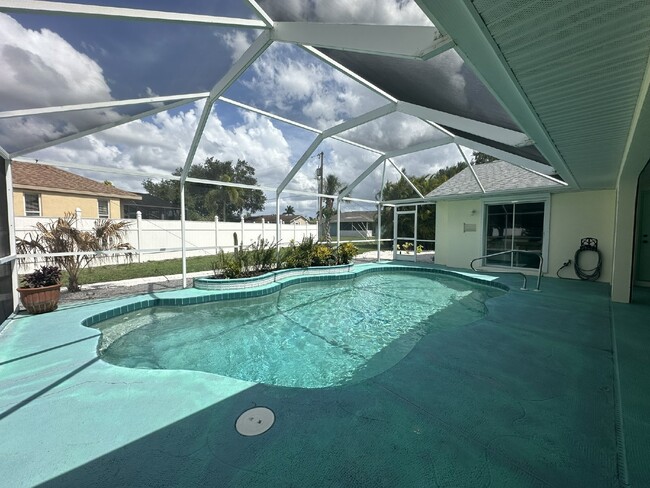 Building Photo - "Charming 3-Bedroom Home with Pool Oasis"