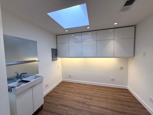 Building Photo - STUNNING THREE BEDROOM PLUS OFFICE MARINER GREEN CONDO WITH GREAT OUTDOOR SPACE