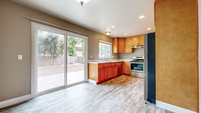 Building Photo - Bright 2 Bedroom, 1 Bathroom Single Family Home! Attached 2 Car Garage and Landscaping Included!