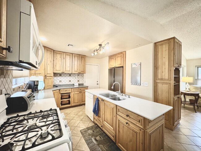 Building Photo - Fully Furnished Henderson Rental Near Cadence | 2 Bed Home w/ Solar + Backyard | Close to Cowabun...