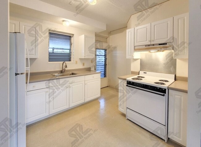 Building Photo - Ground Floor Rental in Kalihi - 1BR / 1Bath / 1Pkg