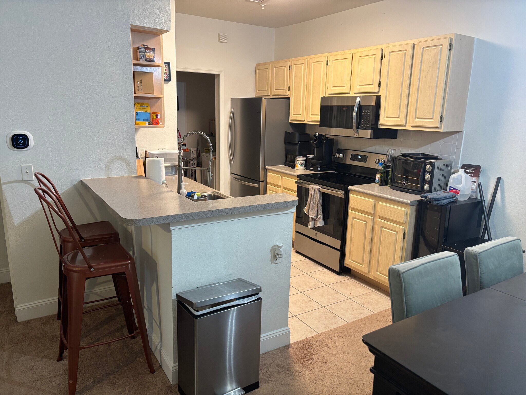 Kitchen is open to fam/din rooms - 2627 Maitland Crossing Way