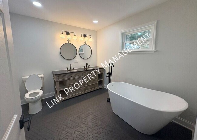 Building Photo - JUST REDUCE!  Sophisticated Tri-Level Home in Stuart Heights — Modern Comfort & Timeless Charming...