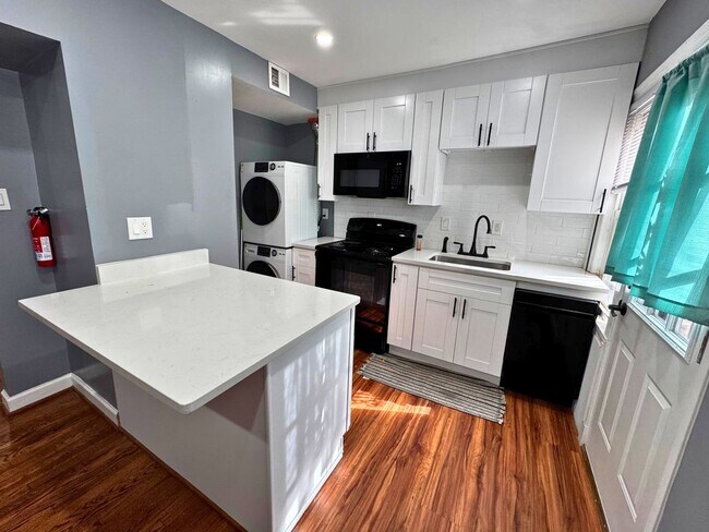 Building Photo - Welcome to your new 2 level TH style apartment home