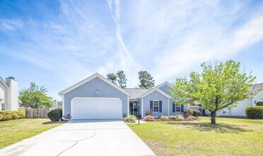 Building Photo - Charming home nestled in Courtney Pines with full fenced backyard!
