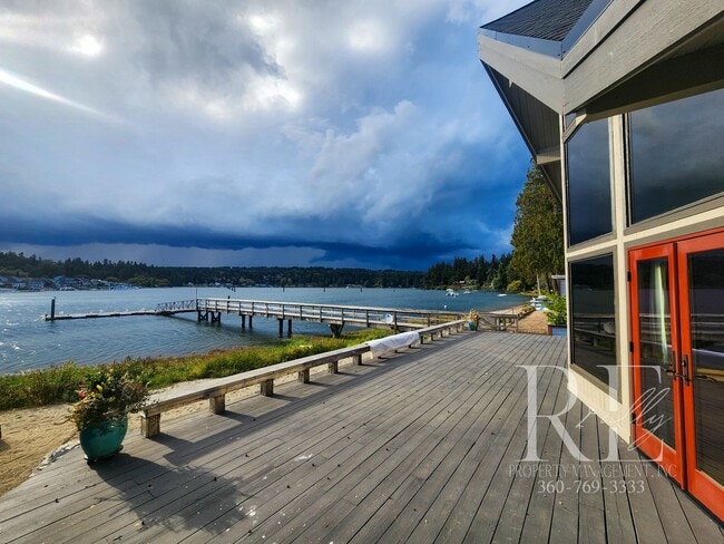 Building Photo - Waterfront Living in Indianola – Dock, Bea...