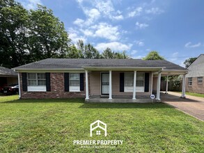 Building Photo - Charming 3BR/2BA in 38118 | Low-Maintenance Tile Floors, Bay Window & Patio
