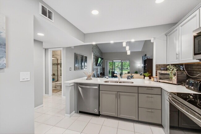 Building Photo - 8364 Boca Glades Blvd E