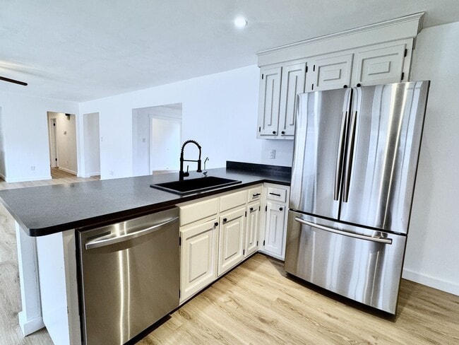 Building Photo - READY NOW!! 4-Bedroom Home in Lake Trant w/Attached Garage! Pet Friendly!