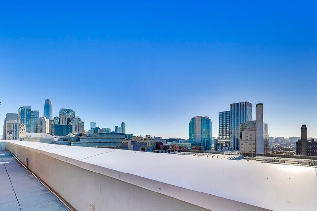 Building Photo - Urban Luxury at SoMa Serif Condos 2BR/2BA | In-Unit Laundry & 24-Hour Security