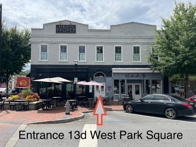 Live directly on Square, enter here. - 13 W Park Sq NE