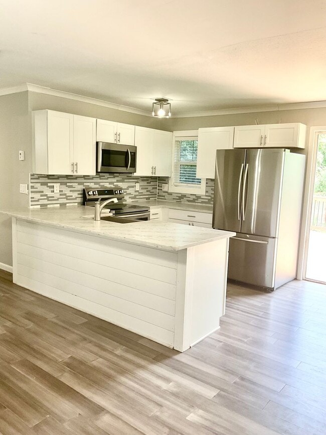 Building Photo - 4 bedroom home on Keith for Rent